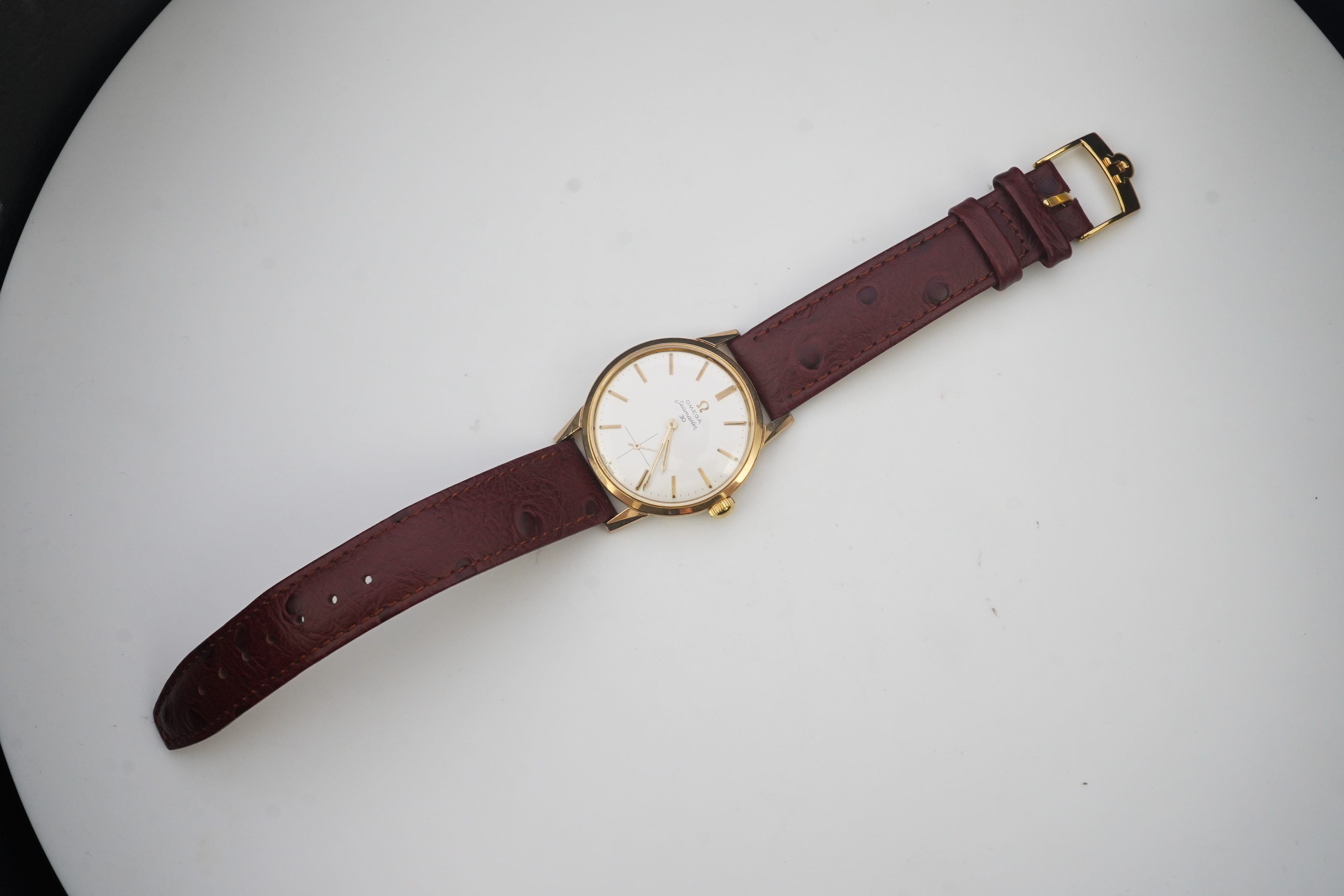 A gentleman's early 1960's steel and gold plated Omega Seamaster 30 manual wind wrist watch, on a later associated leather strap